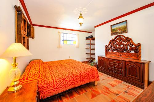 Casa Aurora Garden Retreatにあるベッド