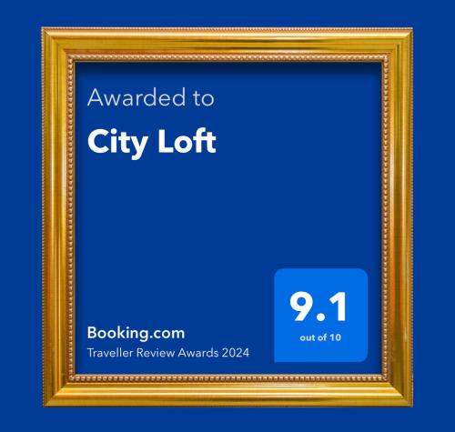 an image of a gold picture frame with the text upgraded to city lot at City Loft in Eisenach