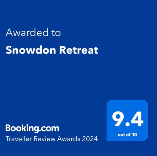 una captura de pantalla de la aplicación theazon Winter premis con el texto concedido al retiro de bola de nieve en Snowdon Retreat, en Llanrug