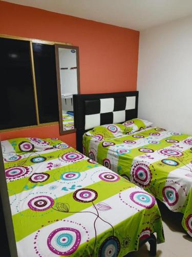 Postel nebo postele na pokoji v ubytování HOTEL VITRU