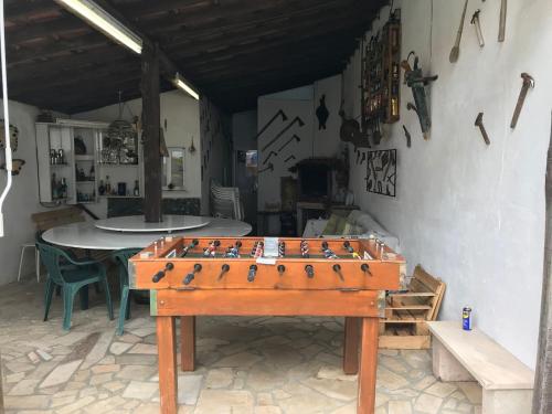 a ping pong table in a room at Refúgio Saloio- LugarTranquilo às Portas de Lisboa in Lousa