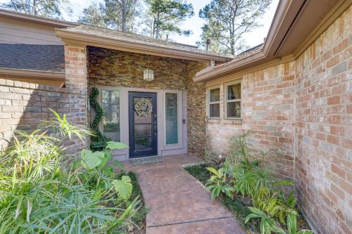 a brick house with a front door and plants at Dog-Friendly Cypress Vacation Rental with Lanai! in Cypress