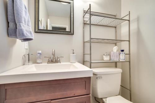 a bathroom with a sink and a toilet at Beaufort Home with Patio 3 Mi to Downtown! in Beaufort