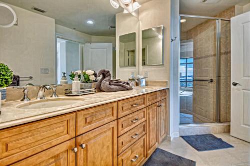 a bathroom with a sink and a shower at Vista Del Mar at Cape Harbour Marina, 10th Floor Luxury Condo, King Bed, Views! in Cape Coral