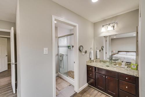 a bathroom with a sink and a shower and a mirror at Stylish San Jose Retreat - 7 Mi to Downtown in San Jose