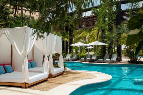 Piscine de l'établissement Jungala Park Hotel at VidantaWorld Riviera Maya ou située à proximité