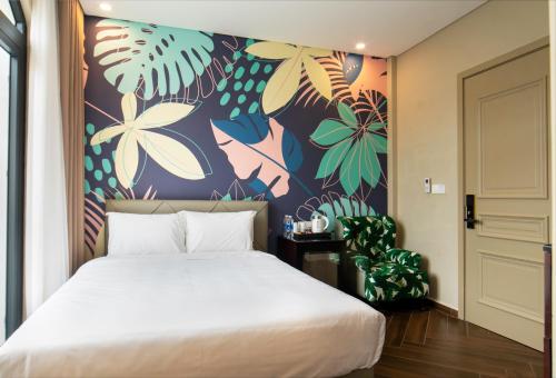Giường trong phòng chung tại Tropical Sea Grand World Phu Quoc