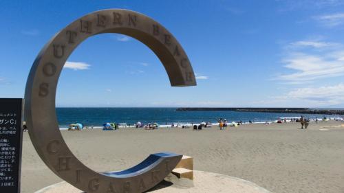 a sculpture of a sign on the beach at Toyoko Inn Chigasaki Shiyakusho in Chigasaki