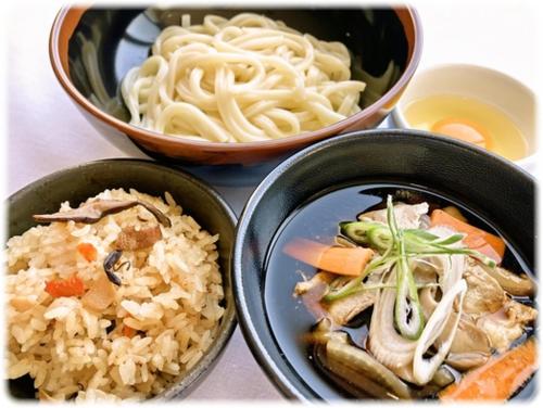 a group of bowls of food with rice and vegetables at Hotel Alpha-One Marugame in Marugame