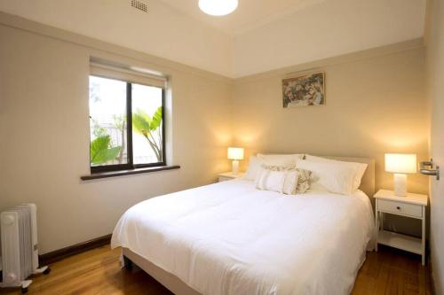 Ένα ή περισσότερα κρεβάτια σε δωμάτιο στο Richmond Delights - 4 Bedrooms and a Big Backyard