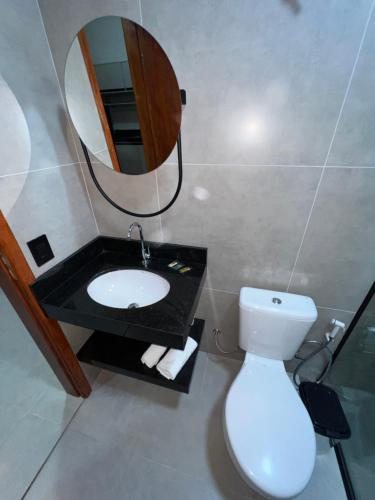 Ванная комната в Casas Pantanal - Privacidade e conforto no centro de Bonito