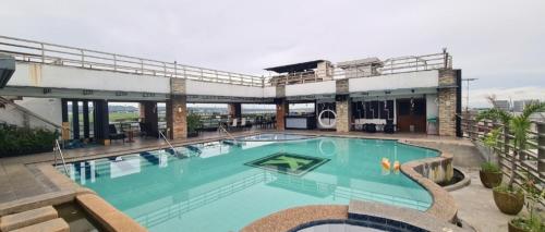 a large swimming pool on top of a building at Kay Hotel and Residences in Angeles
