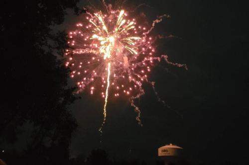 a firework display in the sky at night at Beach Condo on Okaloosa Island Emerald Isle 6th floor 2 bedrooms and murphy bed in Fort Walton Beach