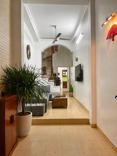 a living room with a couch and a table at The little Ha Noi in Hanoi