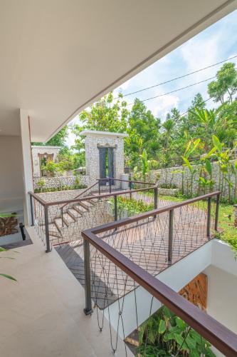 a view from the balcony of a house at Villa Kaliente in Nusa Penida