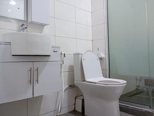 Ένα μπάνιο στο Cata Apartment Hotel And Spa