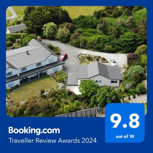 an image of a house with a driveway at Hyecroft Lodge in Whangarei