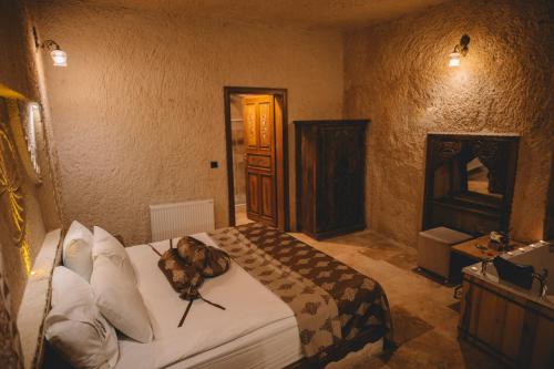 Letto o letti in una camera di Çavuşin Cave House-Cappadocia