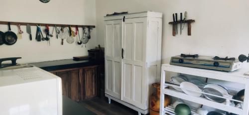 Een keuken of kitchenette bij Magnolia Hideout
