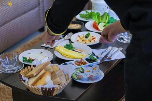 a table with plates of food on it at ميلانا Milana in Jeddah