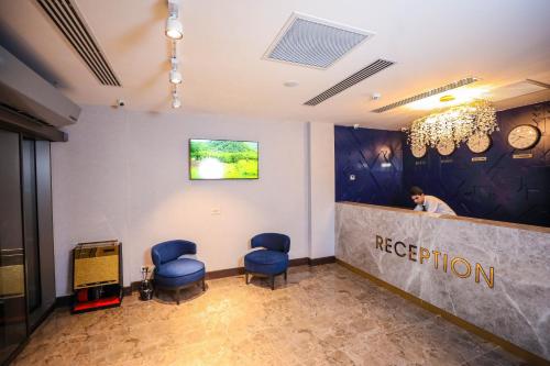 Телевизор и/или развлекательный центр в Arium Hotel Baku