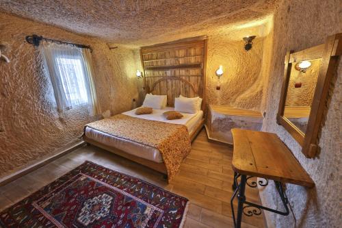 Katil atau katil-katil dalam bilik di Divan Cave House