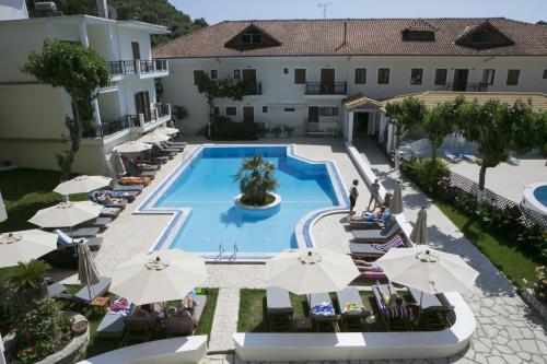 an overhead view of the pool at the resort at Hotel Rezi in Parga