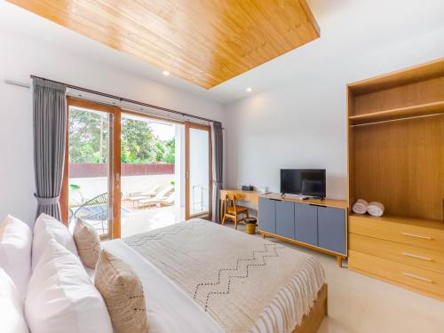 Vitasha Supala Ubud - Ubud Center prime locationにあるテレビまたはエンターテインメントセンター