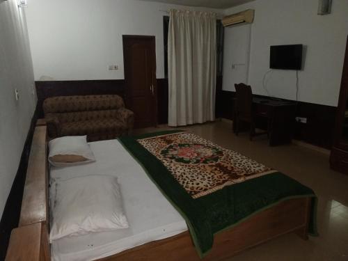 Katil atau katil-katil dalam bilik di Etna hotel
