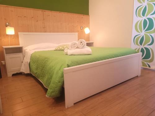 Ліжко або ліжка в номері XX Miglia rooms & apartments