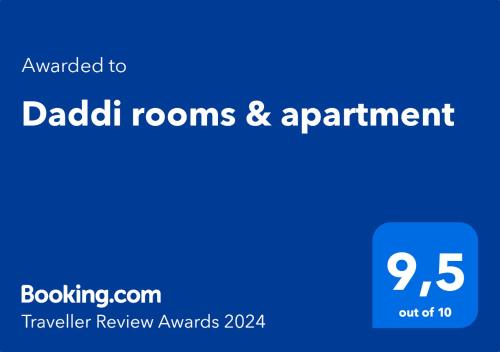 um sinal azul que diz dabbitt quartos e apartamentos em Daddi rooms & apartment em Cagliari