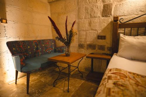 Letto o letti in una camera di Çavuşin Cave House-Cappadocia