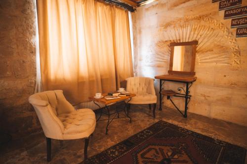 Area soggiorno di Çavuşin Cave House-Cappadocia