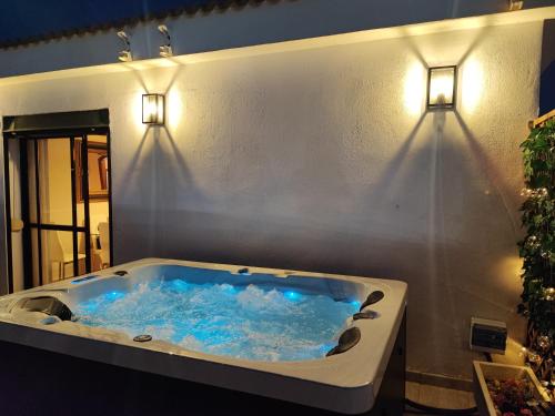 Penthouse with Private Hot Tub ,2 Bedrooms, Walk to Beach