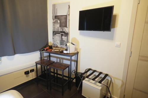 TV a/nebo společenská místnost v ubytování Civico 69 Luxury room