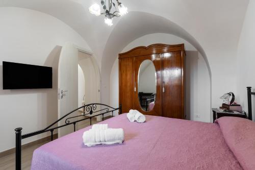 Postel nebo postele na pokoji v ubytování Casa vacanza Sotto La Lizza