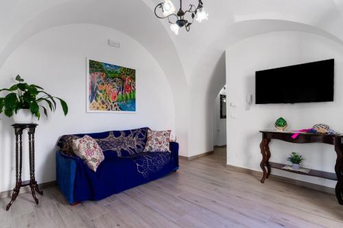 TV a/nebo společenská místnost v ubytování Casa vacanza Sotto La Lizza