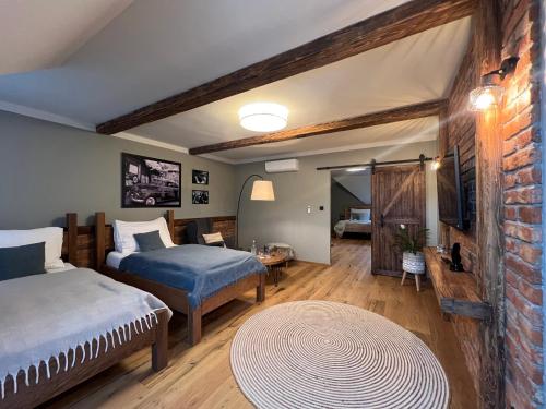 Postel nebo postele na pokoji v ubytování Hotel McLimon