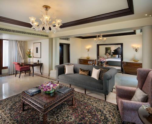 a living room with a couch and a table at Taj Krishna in Hyderabad