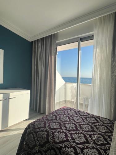 Ένα ή περισσότερα κρεβάτια σε δωμάτιο στο SL La Perla Hotel Kemer
