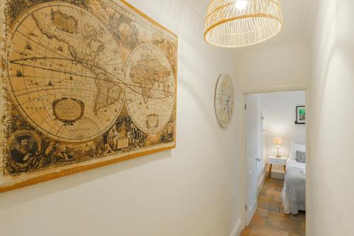 a large map hanging on a wall in a hallway at The Trail by Afan Valley Escapes in Cymmer