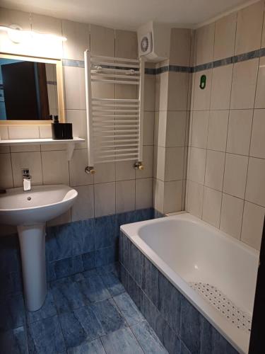 Koupelna v ubytování VATA apartaments