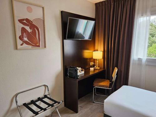 Postel nebo postele na pokoji v ubytování Best Western Terre de Provence