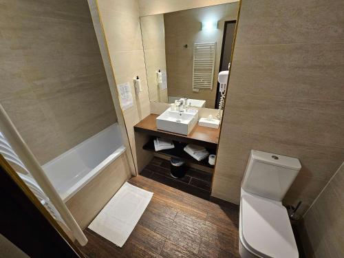 Koupelna v ubytování Best Western Terre de Provence