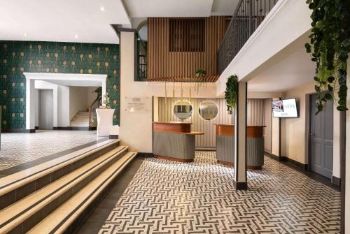 a view of the lobby of a building at Gran Hotel Europa Santo Domingo Trademark Collection by Wyndham in Santo Domingo
