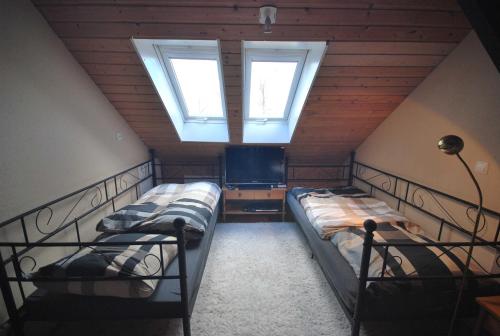 Postel nebo postele na pokoji v ubytování Ferienhaus Eichenhof 35648