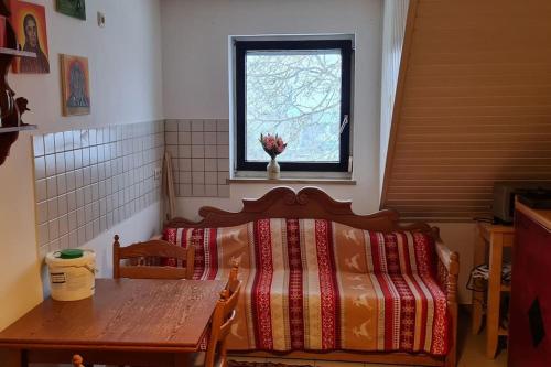 Postel nebo postele na pokoji v ubytování Ruhige Landwohnung auf dem Berg