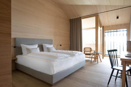 Ένα ή περισσότερα κρεβάτια σε δωμάτιο στο Seegut Zeppelin