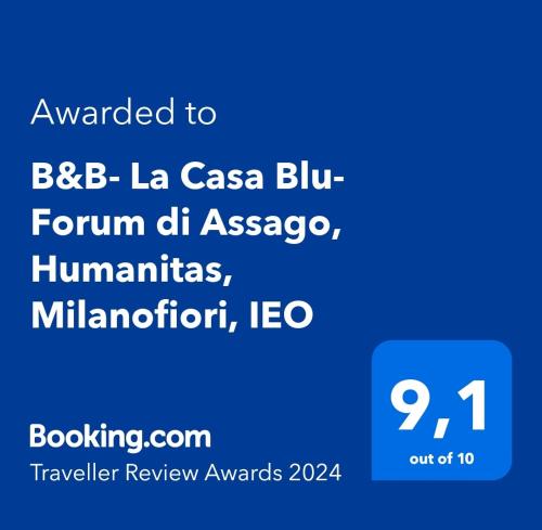 una caja de texto azul con las palabras otorgadas a bbc la casa blle en B&B- La Casa Blu- Forum di Assago, Humanitas, Milanofiori, IEO, en Rozzano