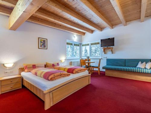 Posteľ alebo postele v izbe v ubytovaní Apartment Grissemann by Interhome